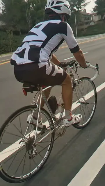 Rider in a black and white kit on the Veloaded Sunday coffee ride